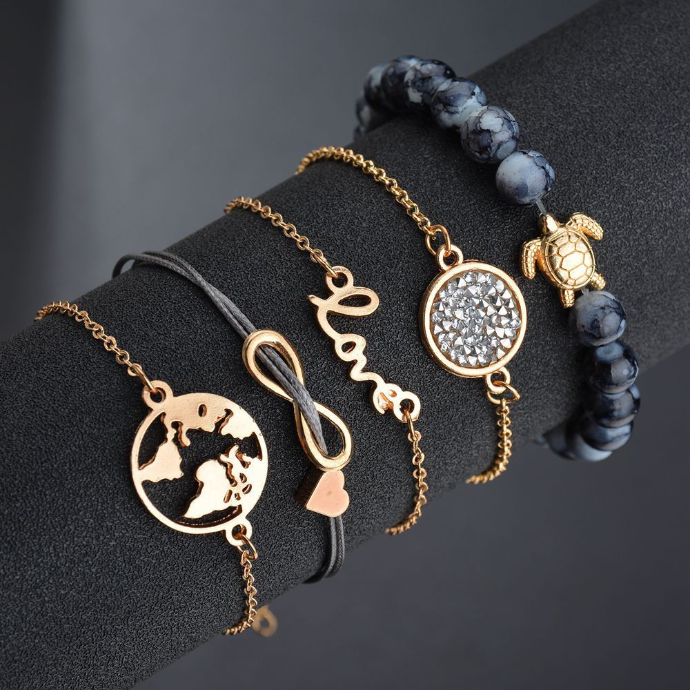 Bracelets and anklets for women and men – charm bracelets, chain anklets, and layered jewelry