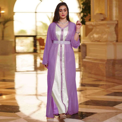 a woman wearing the purple chiffon arabian women's dress full length view