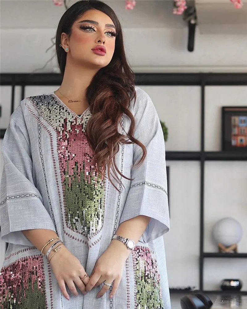 a woman wearing grey dubai beads sequin embroidered robe