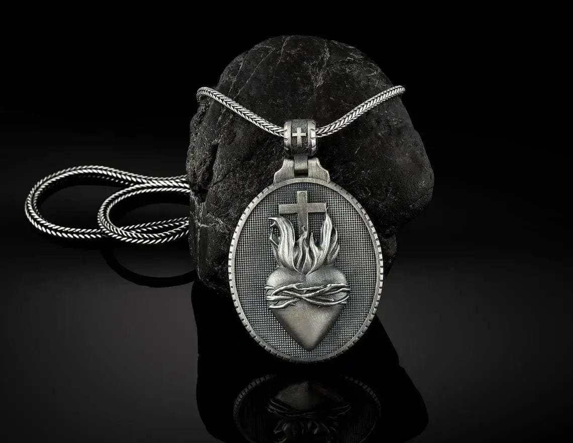 pendant necklace on a rock