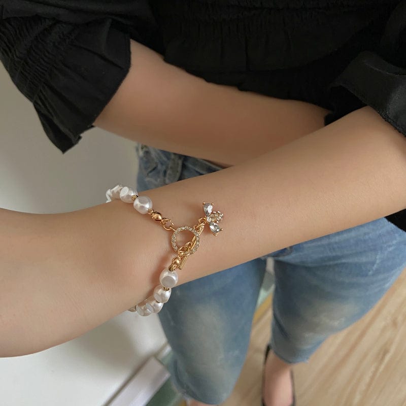 a girl showing Natural Stone Pearl Bracelet on her right wrist 