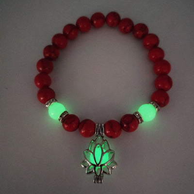 top view of a red Luminous Crystals beaded Bracelet of green light 