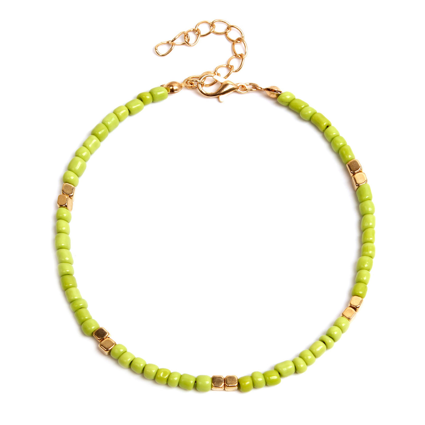 anklet  with green beads and gold accents on a white background