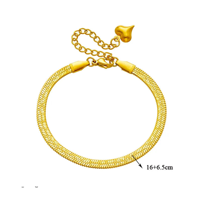 Gold bracelet on a white background with measurement label