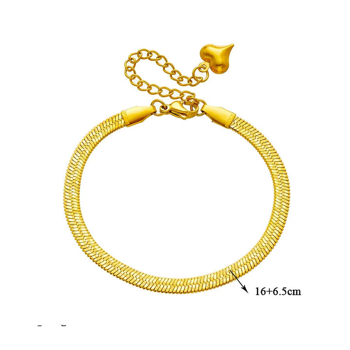 Gold bracelet on a white background with measurement label