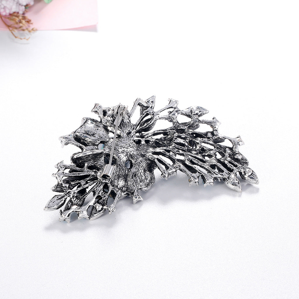 back view of the brooch on a white background