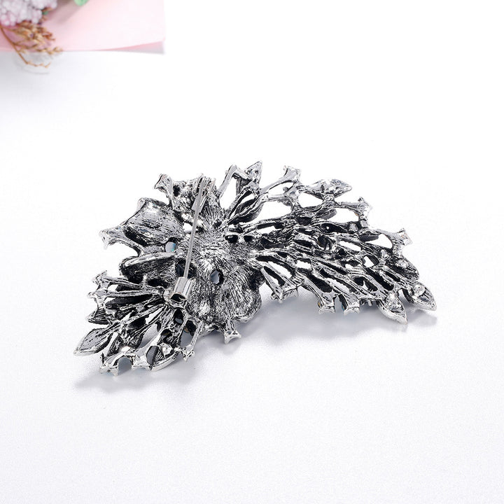 back view of the brooch on a white background