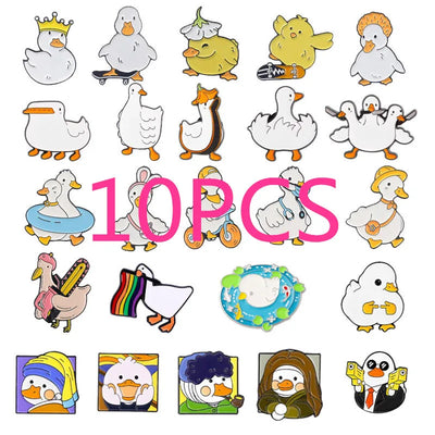 Collection of cartoon duck figurines with various accessories and poses on a white background.