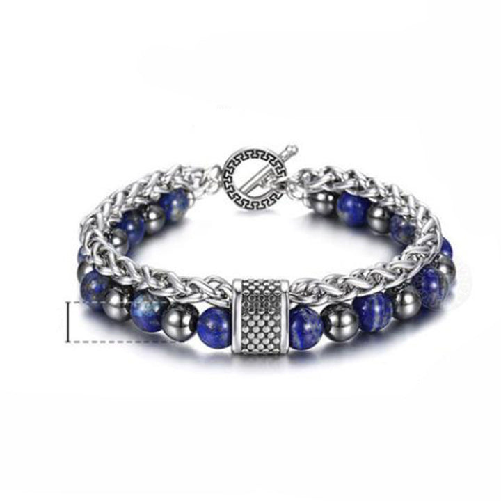 Bracelet with blue and silver beads on a white background