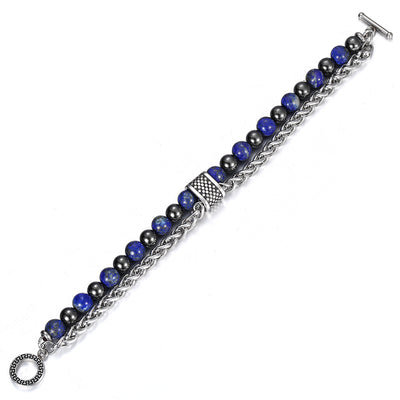 Bracelet with blue and black beads on a white background