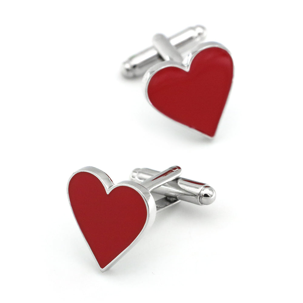 Red heart-shaped cufflinks with silver borders on a white background