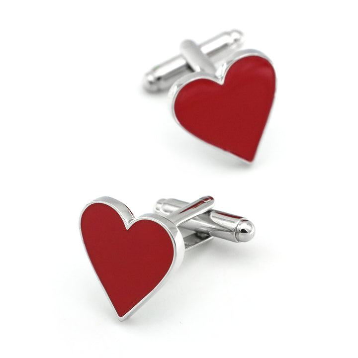 Red heart-shaped cufflinks with silver borders on a white background