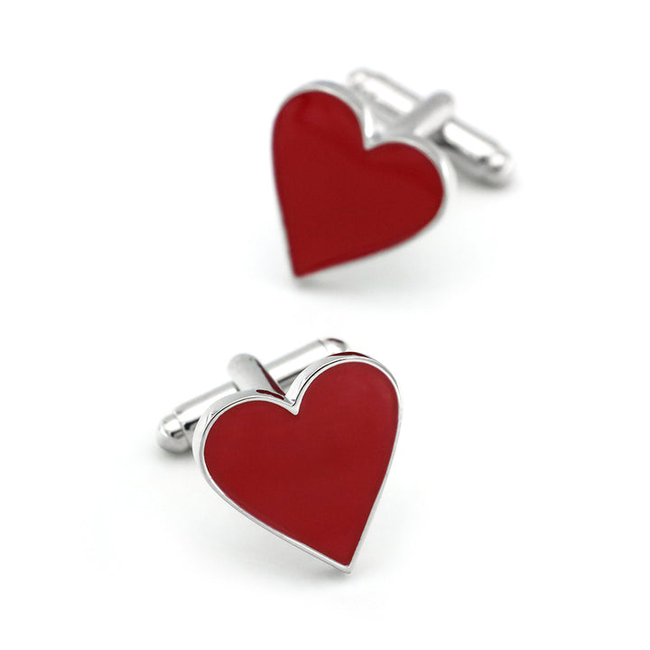 Red heart-shaped cufflinks on a white background