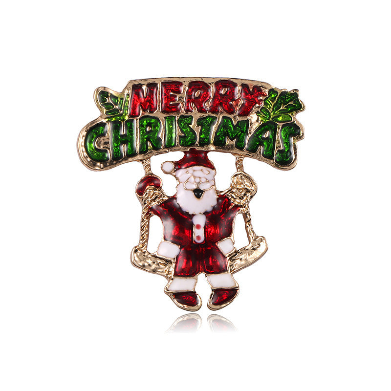 Christmas-themed brooch with Santa Claus and &