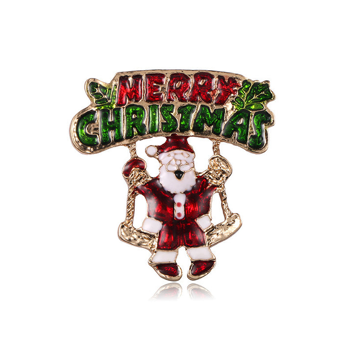 Christmas-themed brooch with Santa Claus and &