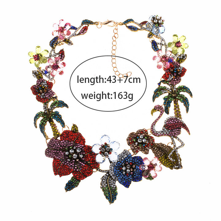 Colorful necklace with floral and flamingo designs on a white background and measurements 