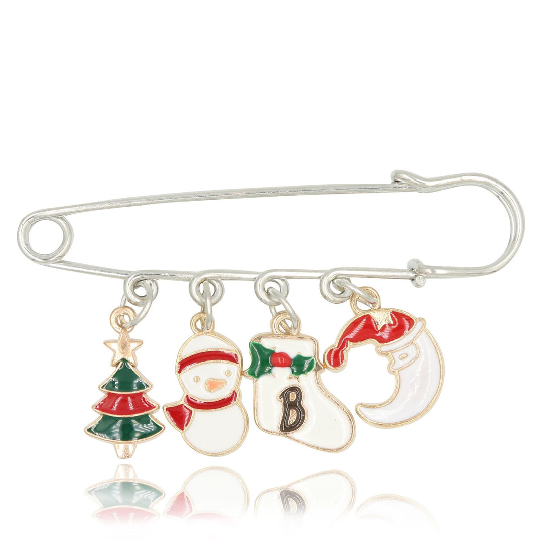Christmas-themed brooch with charms including a tree, snowman, stocking, and letter &