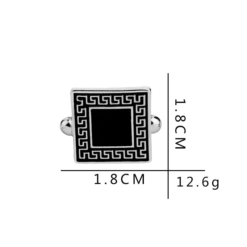 Cufflink with measurements on a white background