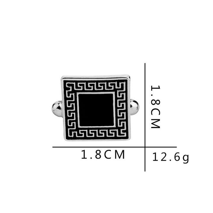 Cufflink with measurements on a white background
