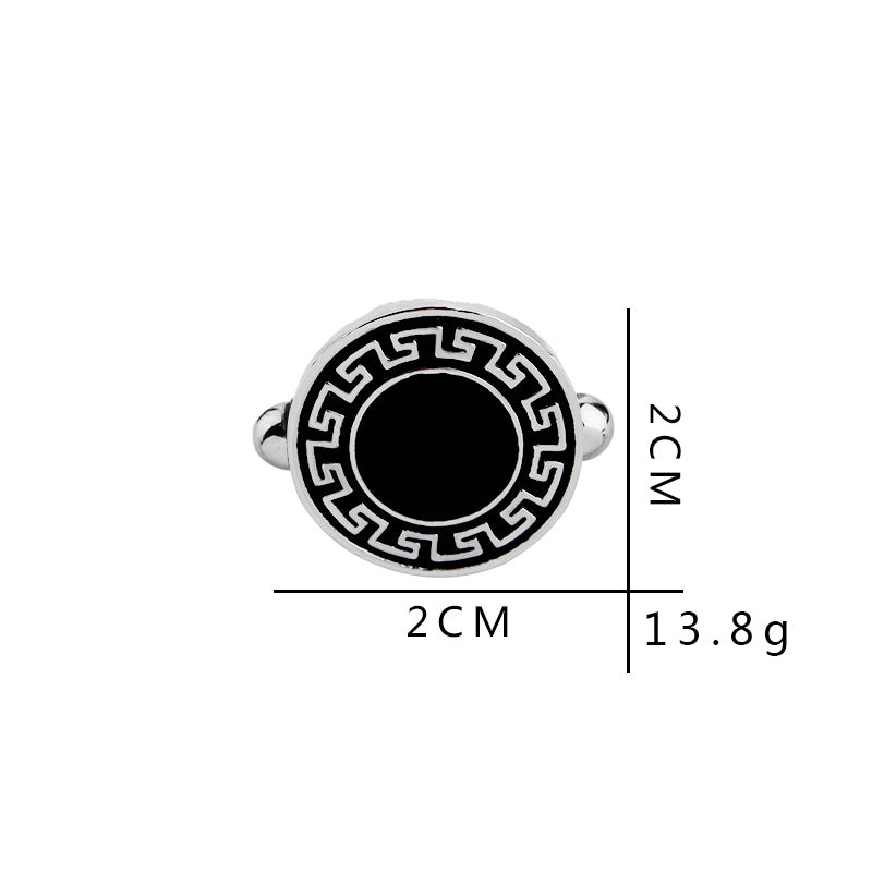 Cufflink with measurements on a white background