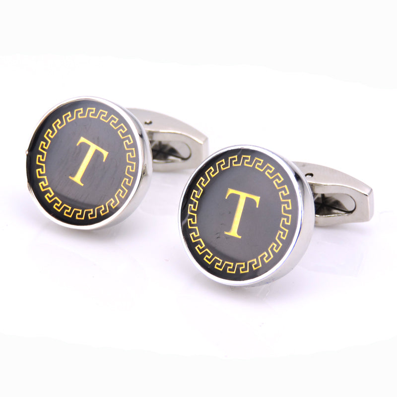 Cufflinks with a yellow &