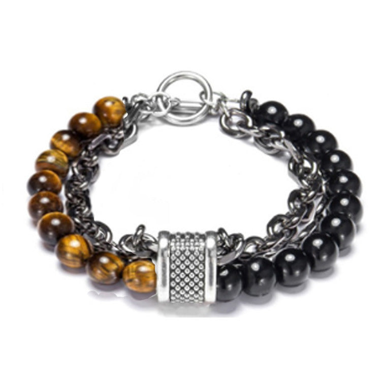 Multistrand bracelet with tiger eye and black beads on a white background