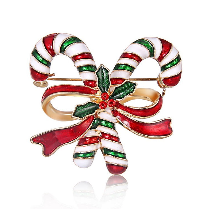 Candy cane-shaped brooch with red, green, and white colors on a white background