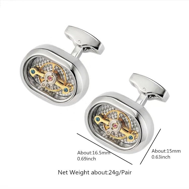Silver cufflinks with mechanical design on a white background
