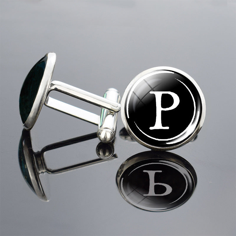 Cufflinks with a letter &