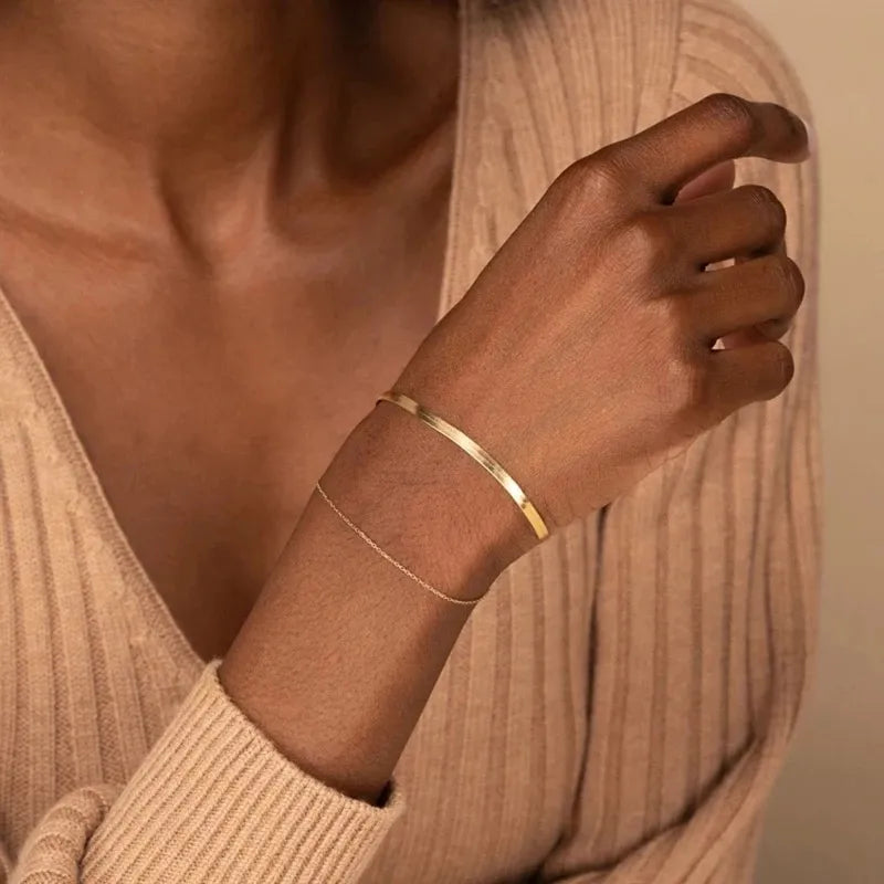 Gold bracelet on a person&