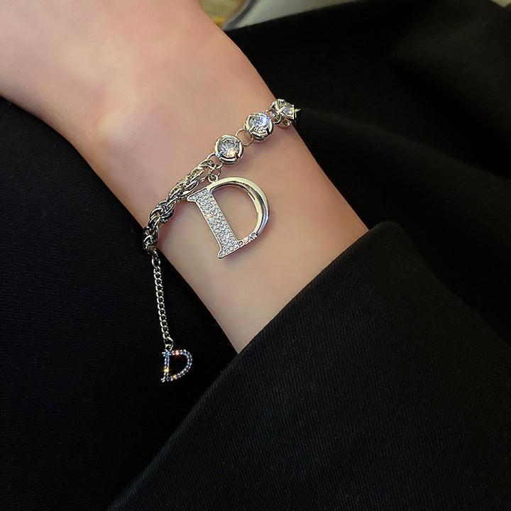 Silver bracelet with letter &