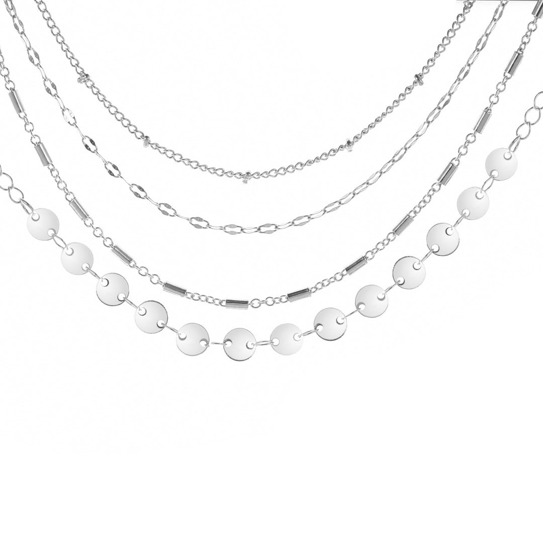 four silver necklaces with different chain designs on a white background