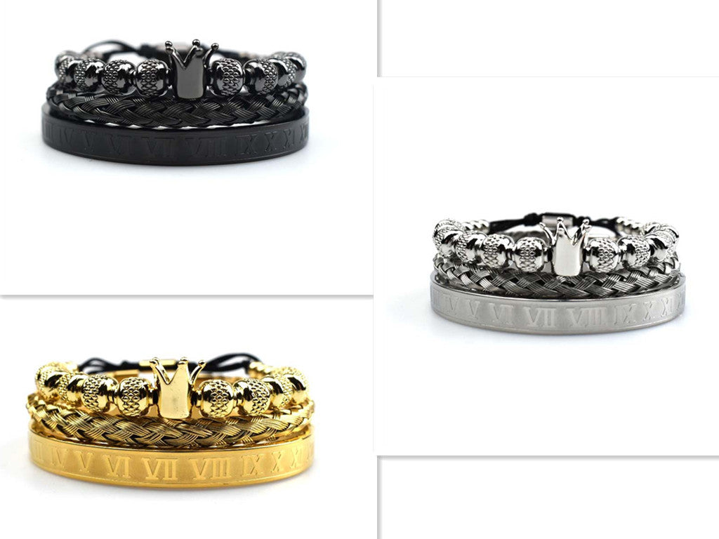 Three bracelets in black, silver, and gold on a white background