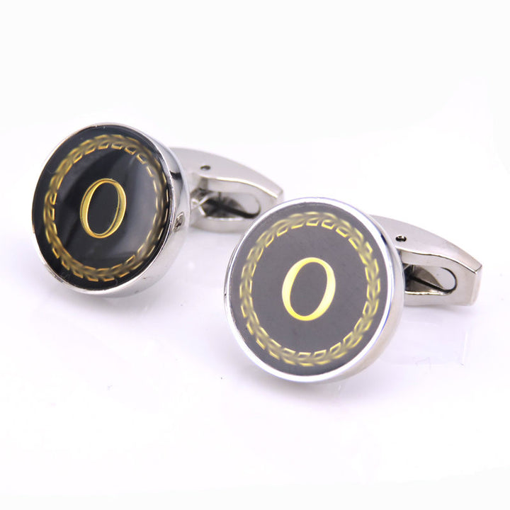 Cufflinks with a letter &