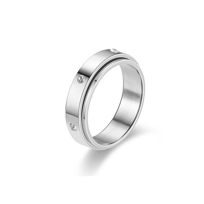 Silver ring with small diamonds on a white background