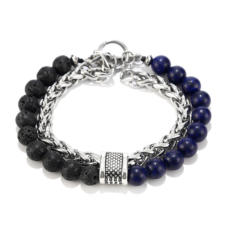 Bracelet with black and blue beads and silver chain on a white background