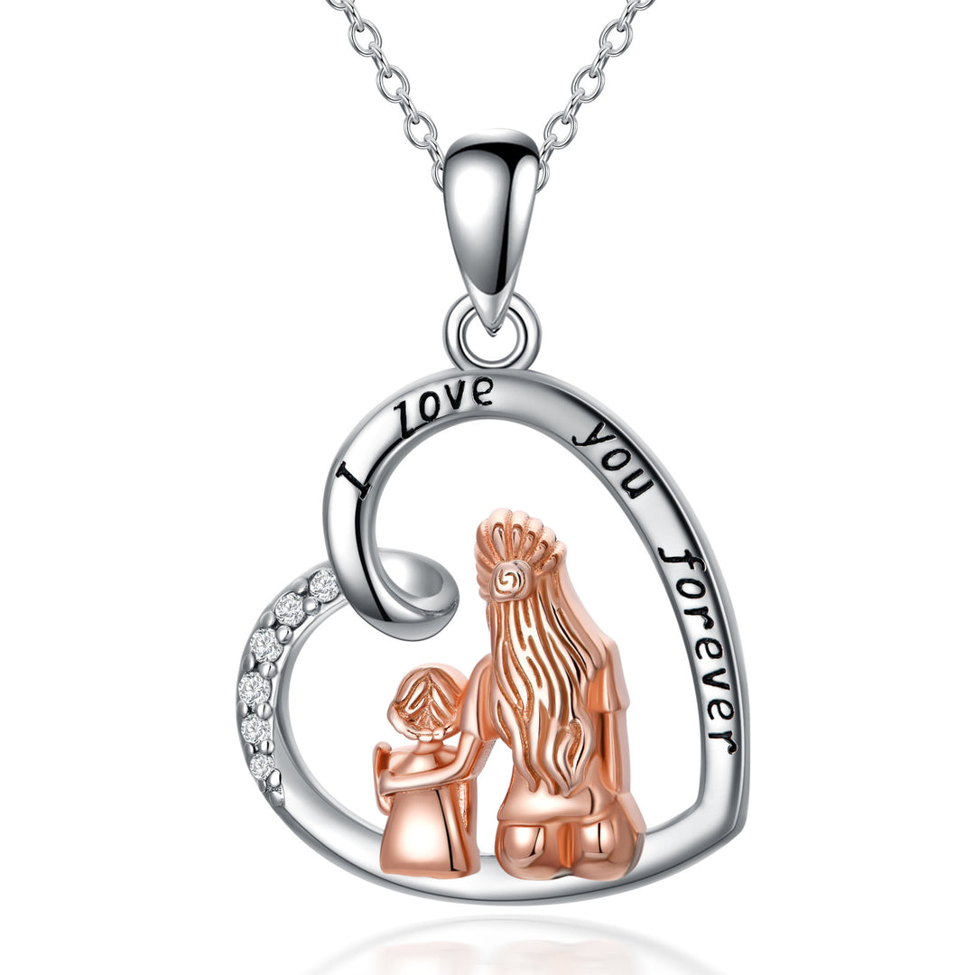 Silver necklace with heart-shaped pendant featuring a dog and cat, engraved with &