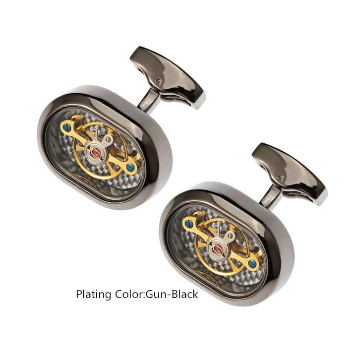 Pair of cufflinks with mechanical design on a white background