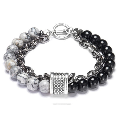 Multistrand bracelet with beads and metal clasp on a white background