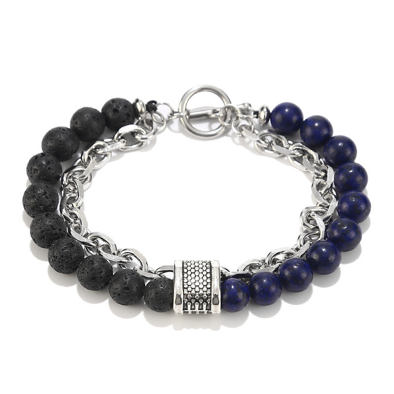Bracelet with black and blue beads and silver chain on a white background