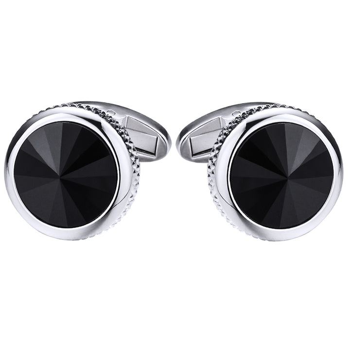 Pair of black gemstone cufflinks with silver borders on a white background
