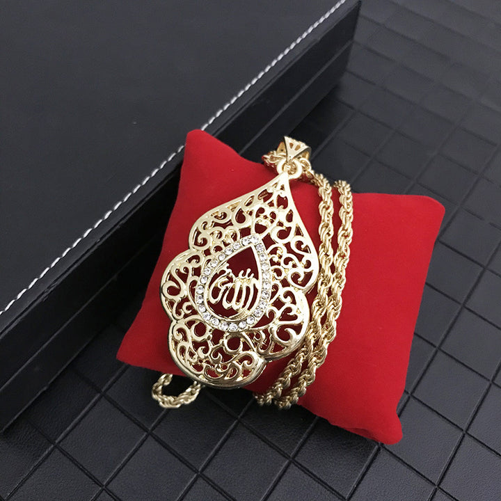 Gold necklace with intricate design and God&