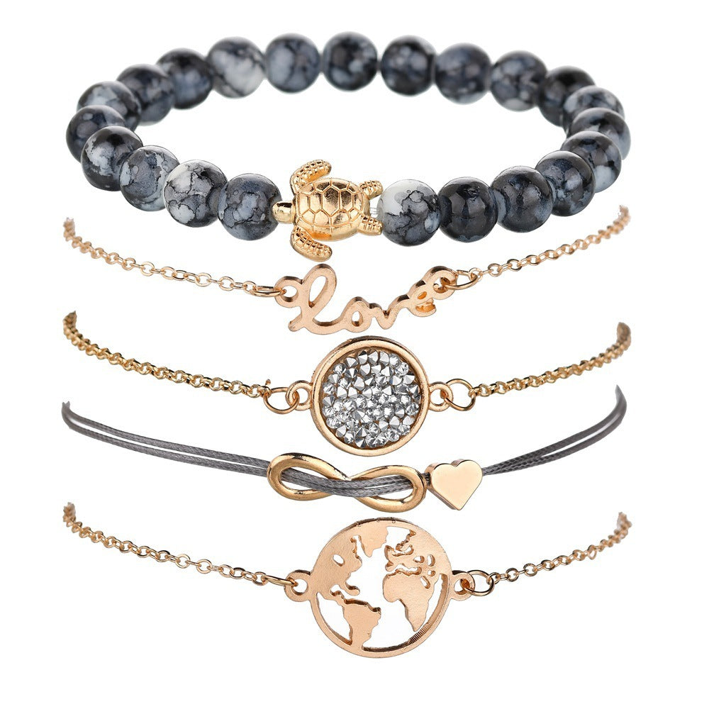 Set of five bracelets with various designs on a white background