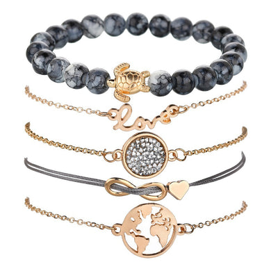 Set of five bracelets with various designs on a white background