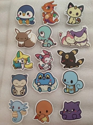 Collection of cartoon animal stickers on a textured surface