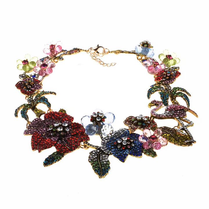 Colorful floral necklace with gemstones on a white background