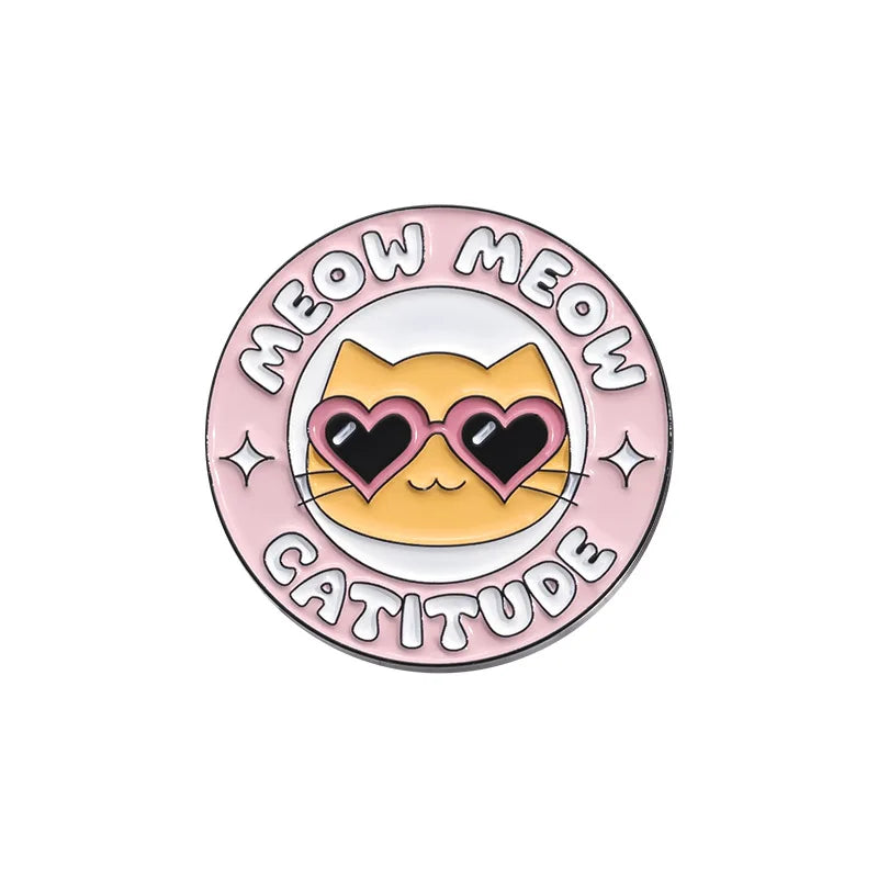 Circular badge with a cat face, heart-shaped eyes, and 'MEOW MEOM CATITUDE' text on a pink background.