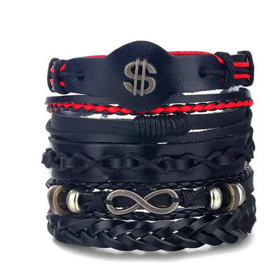 Stack of black leather bracelets with metal symbols on a white background