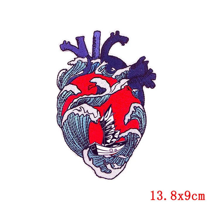 Heart-shaped design with red center and blue outer outline on a white background