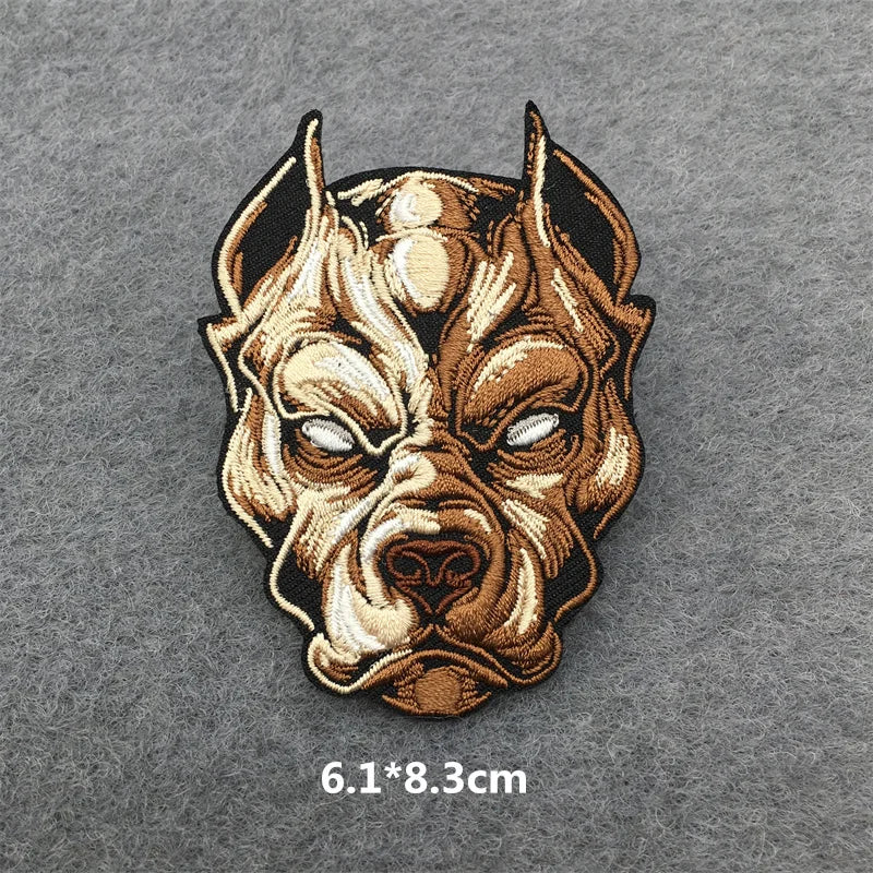 Dog head patch with brown and beige colors on a gray background
